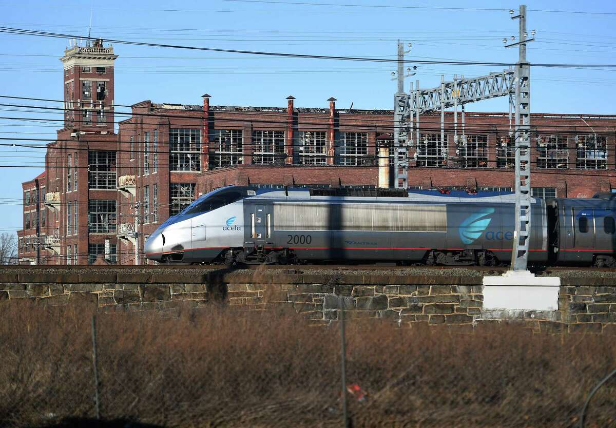 An Acela train heads across the East Side of Bridgeport, Conn., site of a proposed second Bridgeport train station, on Monday, February 03, 2020.
