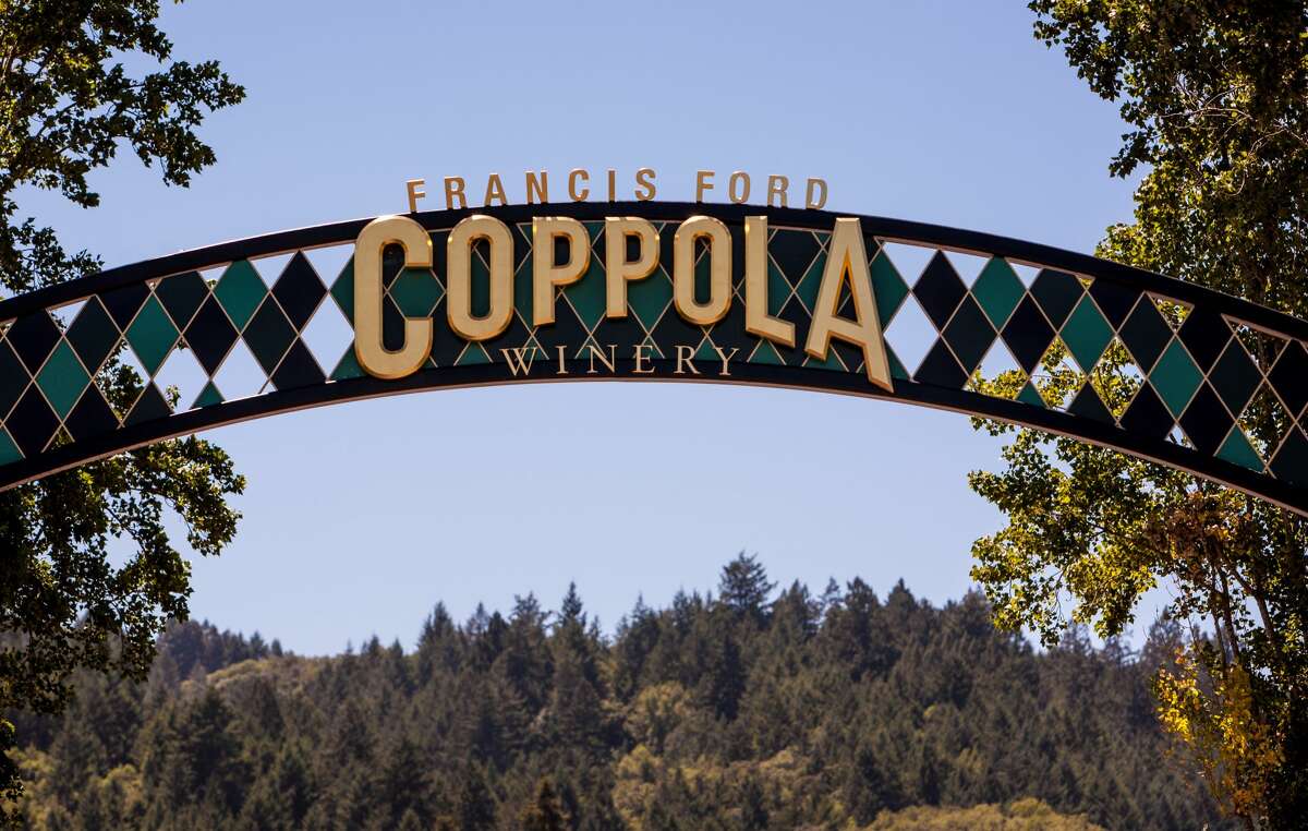 FILE - Warm sunny days are attracting Wine Country visitors to Francis Ford Coppola Winery on July 13, 2013, near Geyserville, California. Coppola has sold off his wine portfolio to another family-owned wine business. 