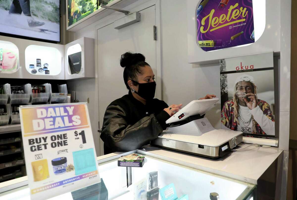 Cindy De La Vega, the first Latina dispensary owner in San Francisco, works inside her store, STIIIZY Union Square, on in San Francisco, Calif. At a time when so many other businesses were closing down, cannabis in San Francisco has seen an enormous boom. Permits for dispensaries were off the chart during the last year, and at least 10 storefronts have opened in the last year, even though cannabis as a whole got zero small business aid during the pandemic.