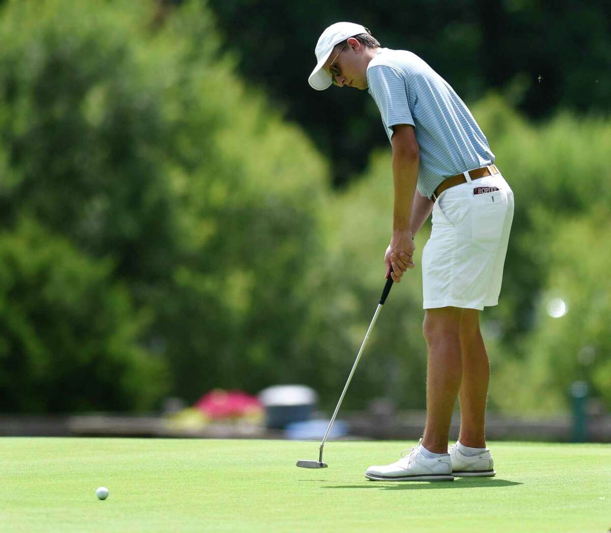 Ben Ropiak putts in the 76th Annual Town Wide Men's Golf Tournament at Griffith E. Harris Golf Course in Greenwich, Conn. Sunday, June 27, 2021. Ropiak won the Town Wide title, shooting a two-round score of 145.
