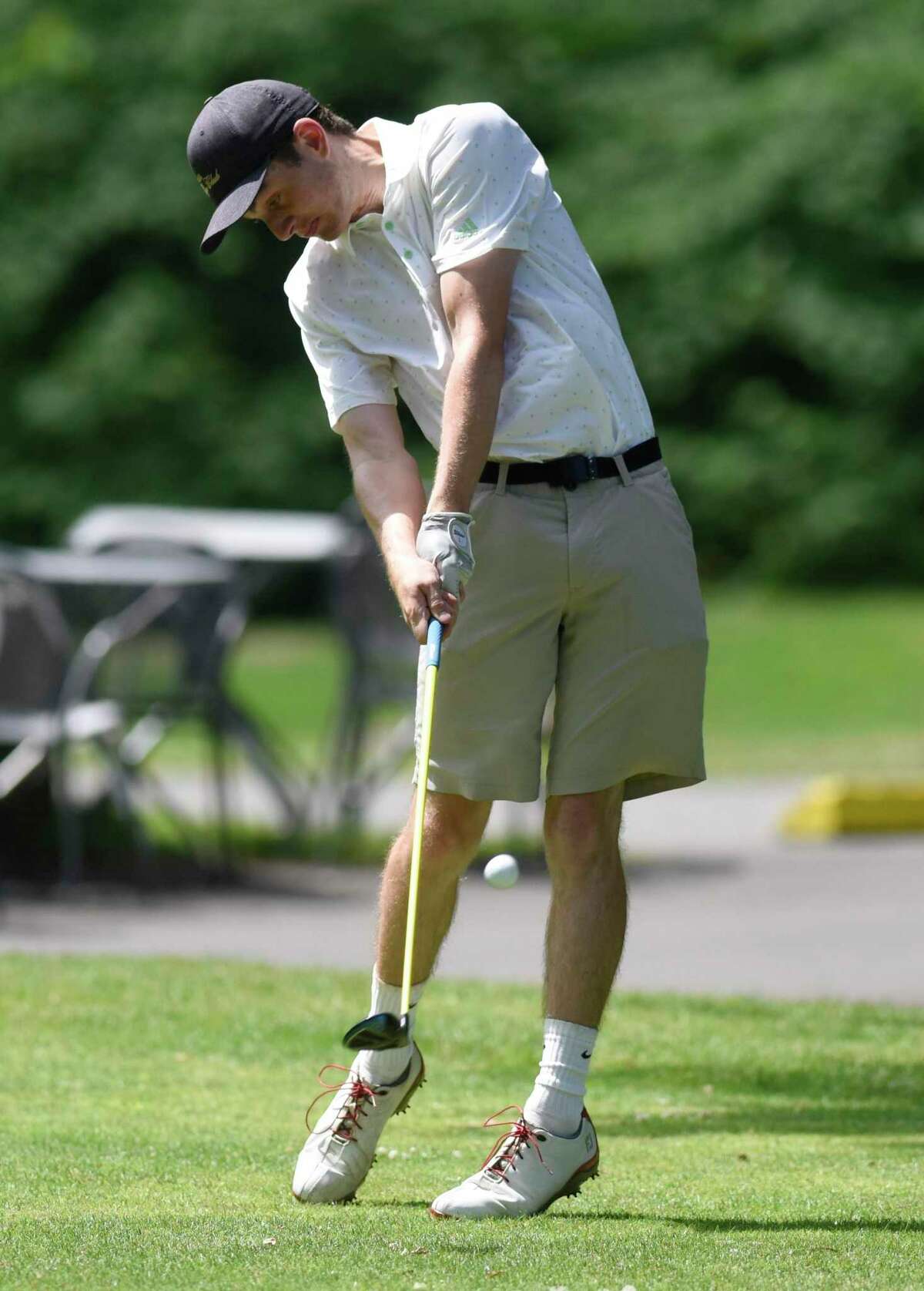 Michael Hickey tees off in the 76th Annual Town Wide Men's Golf Tournament at Griffith E. Harris Golf Course in Greenwich, Conn. Sunday, June 27, 2021.