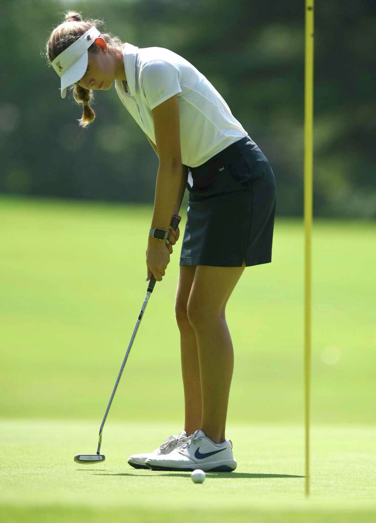 Juliette Santulin putts in the Town Wide Women's Golf Tournament at Griffith E. Harris Golf Course in Greenwich, Conn. Monday, June 28, 2021.