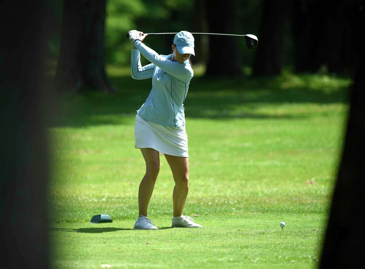 Anne-Laure Coby putts in the Town Wide Women's Golf Tournament at Griffith E. Harris Golf Course in Greenwich, Conn. Monday, June 28, 2021.