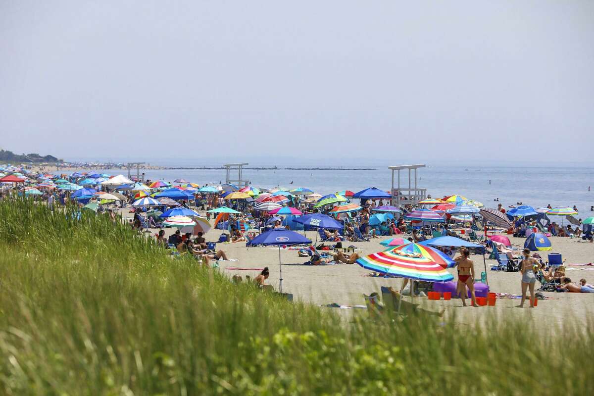 Crowds gathered Tuesday at Hammonasset Beach State Park in Madison as temperatures rose into the 90s last summer. Attendance at Connecticut state parks remained close to 50 percent above pre-pandemic levels in 2022, according to early estimates by the Department of Energy and Environmental Protection. 
