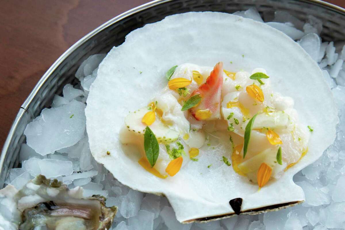 A raw scallop served at Snail Bar in Oakland. The team’s second bar, Slug in downtown Oakland, will serve a similar dish.