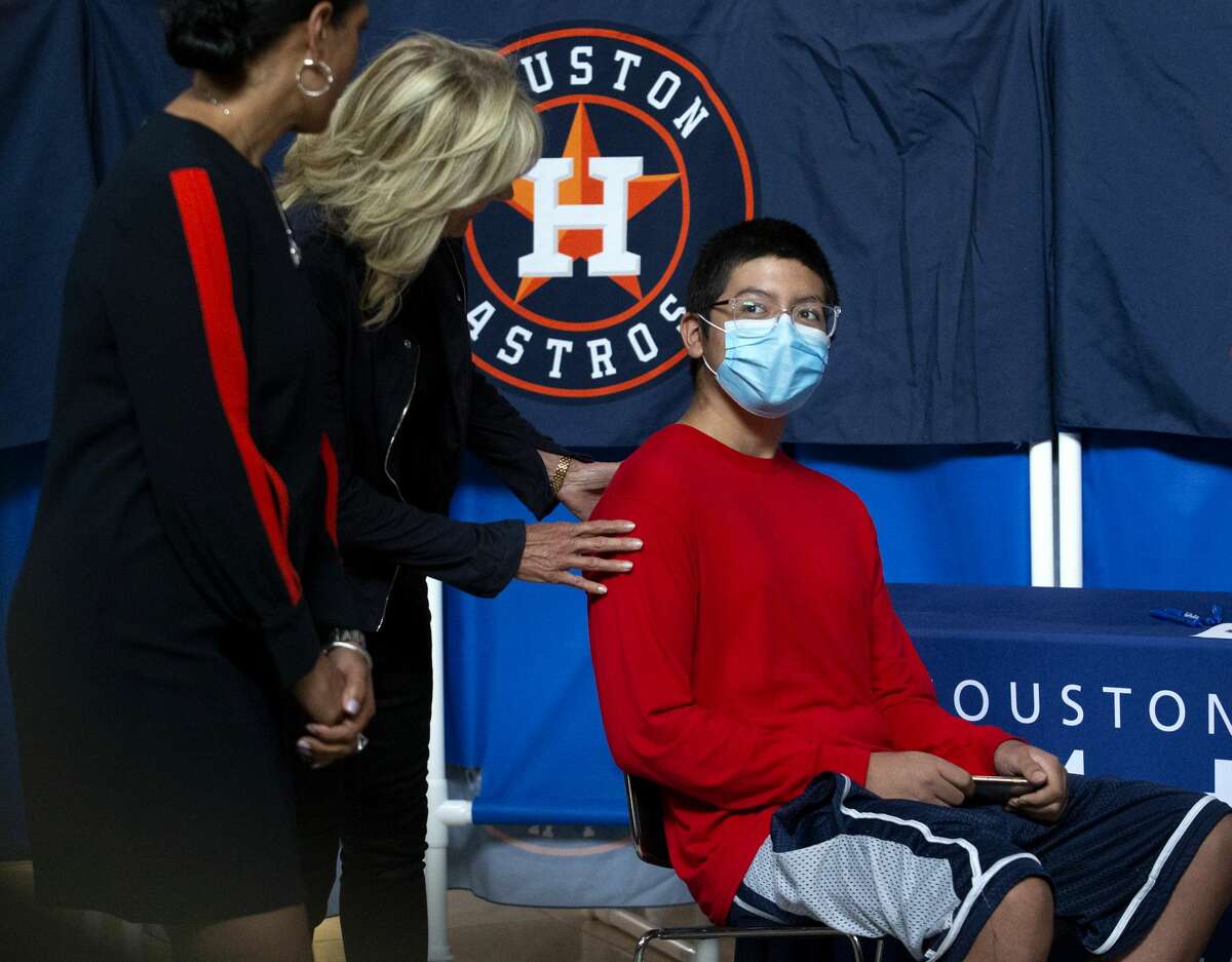 First Lady Jill Biden, who is visiting and touring the Houston Astros’ vaccination event, says good-bye to Jose Cabos, a COVID-19 vaccination participant, Tuesday, June 29, 2021, at Minute Maid Park in Houston. The Astros, in partnership with Houston Methodist, hosted free vaccinations to the public.