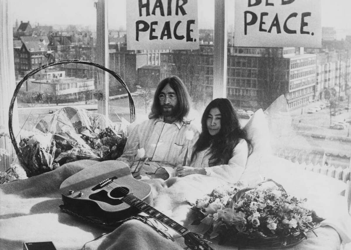John Lennon and Yoko Ono The power couple of former Beatle John Lennon and musician and artist Yoko Ono primarily focused on promoting peace with their works of art, with 