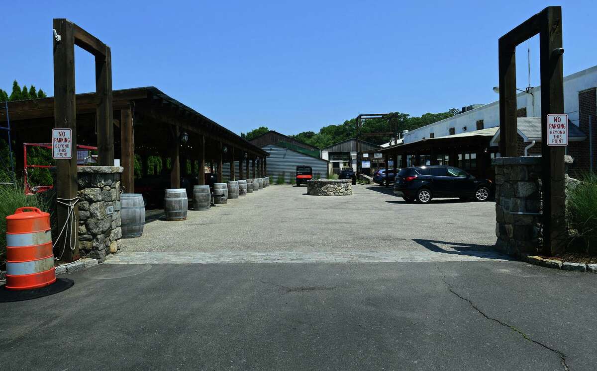 The outdoor area at 314 Wilson Avenue Tuesday, June 29, 2021, in South Norwalk, Conn. The space which includes a bar is being sought by a developer who is seeking city approval to open a farmer's market and beer garden there.