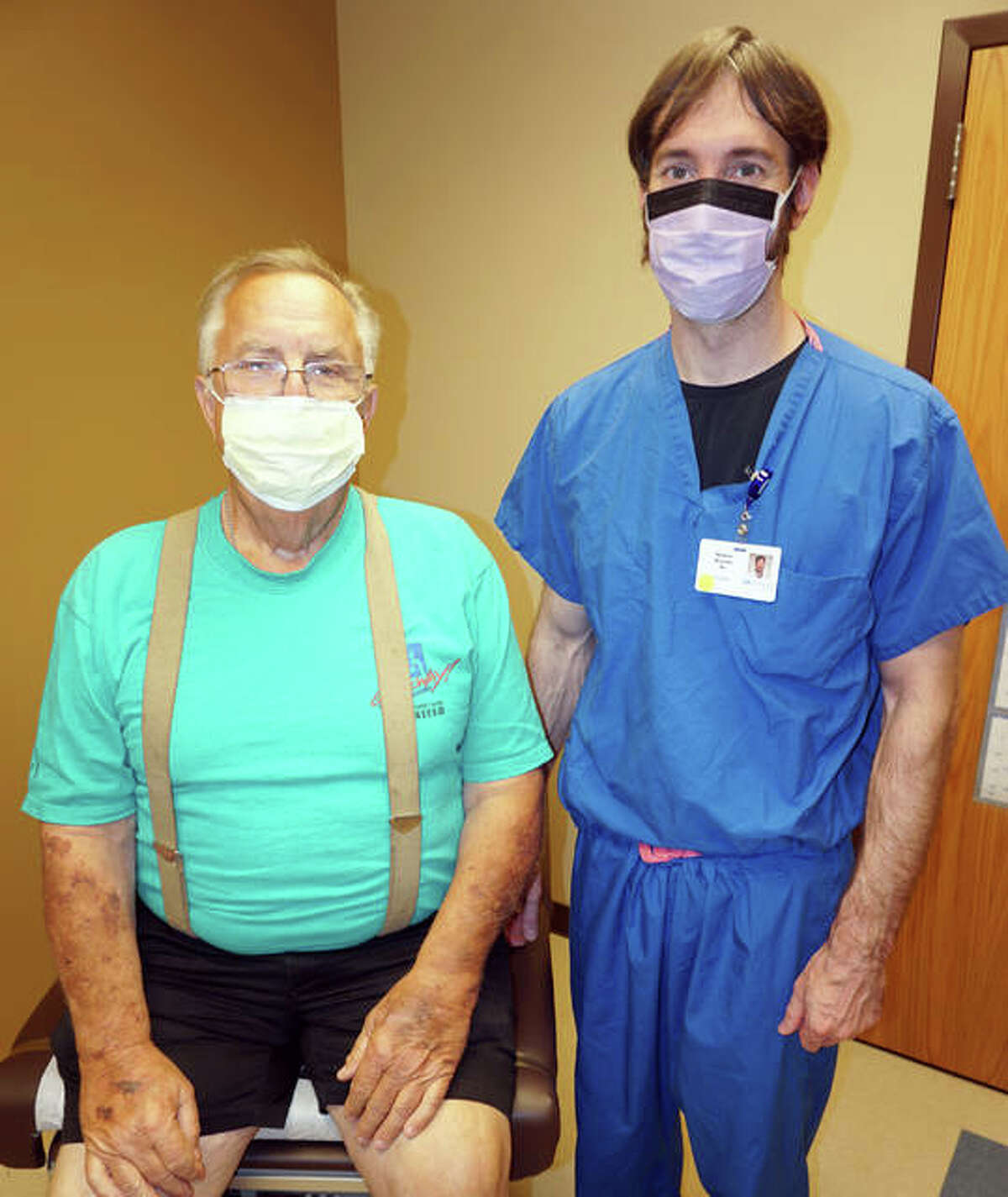 Paul Waters of Bunker Hill is shown with Dr. Matthew Musielak, the surgeon at Alton Memorial Hospital who leads the Bariatrics program. Through the program, Waters has lost 59 pounds.