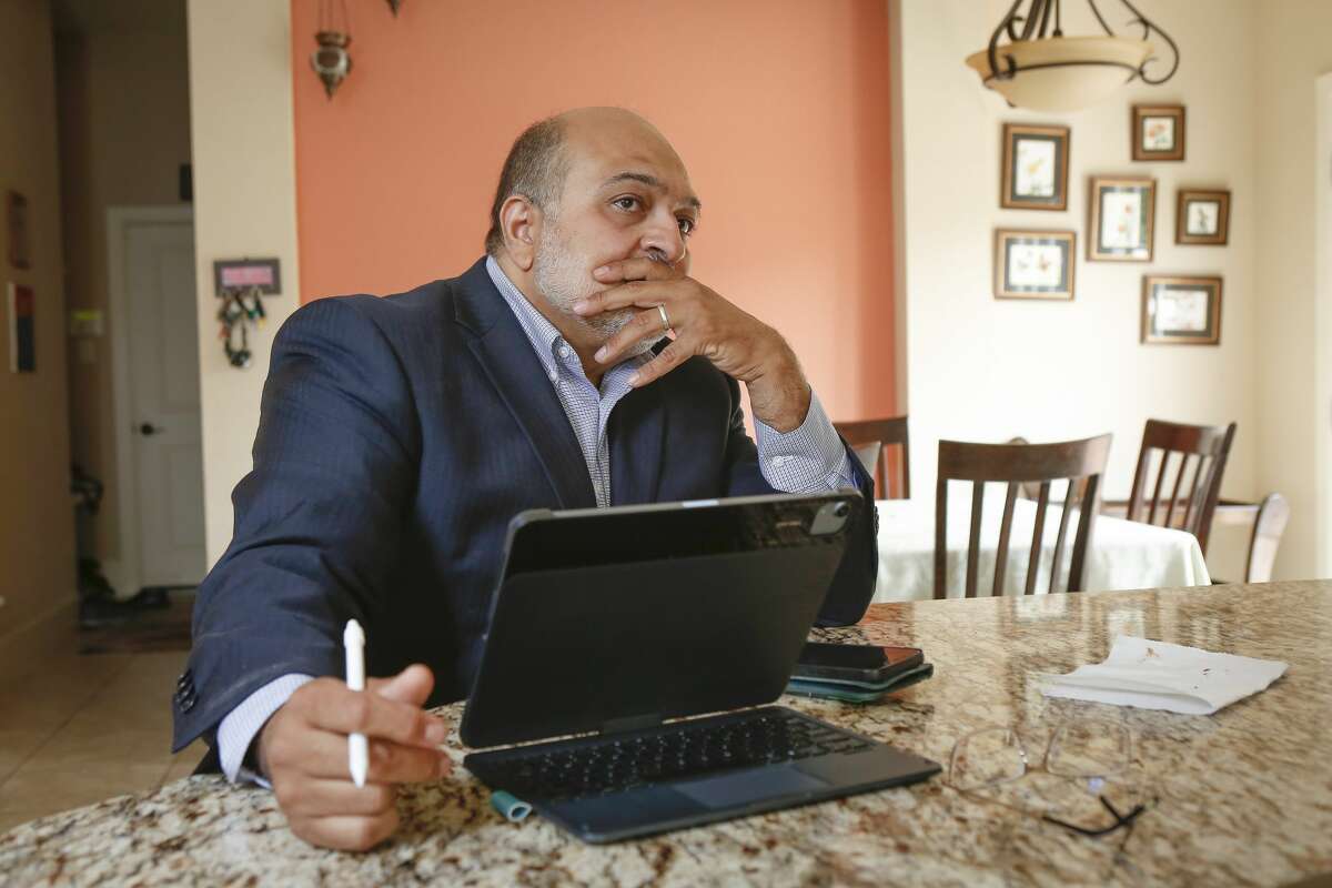 Hasan Gokal is interviewed by a reporter via the phone after receiving a no-billed by Harris County grand jury Wednesday, June 30, 2021, in Sugar Land.