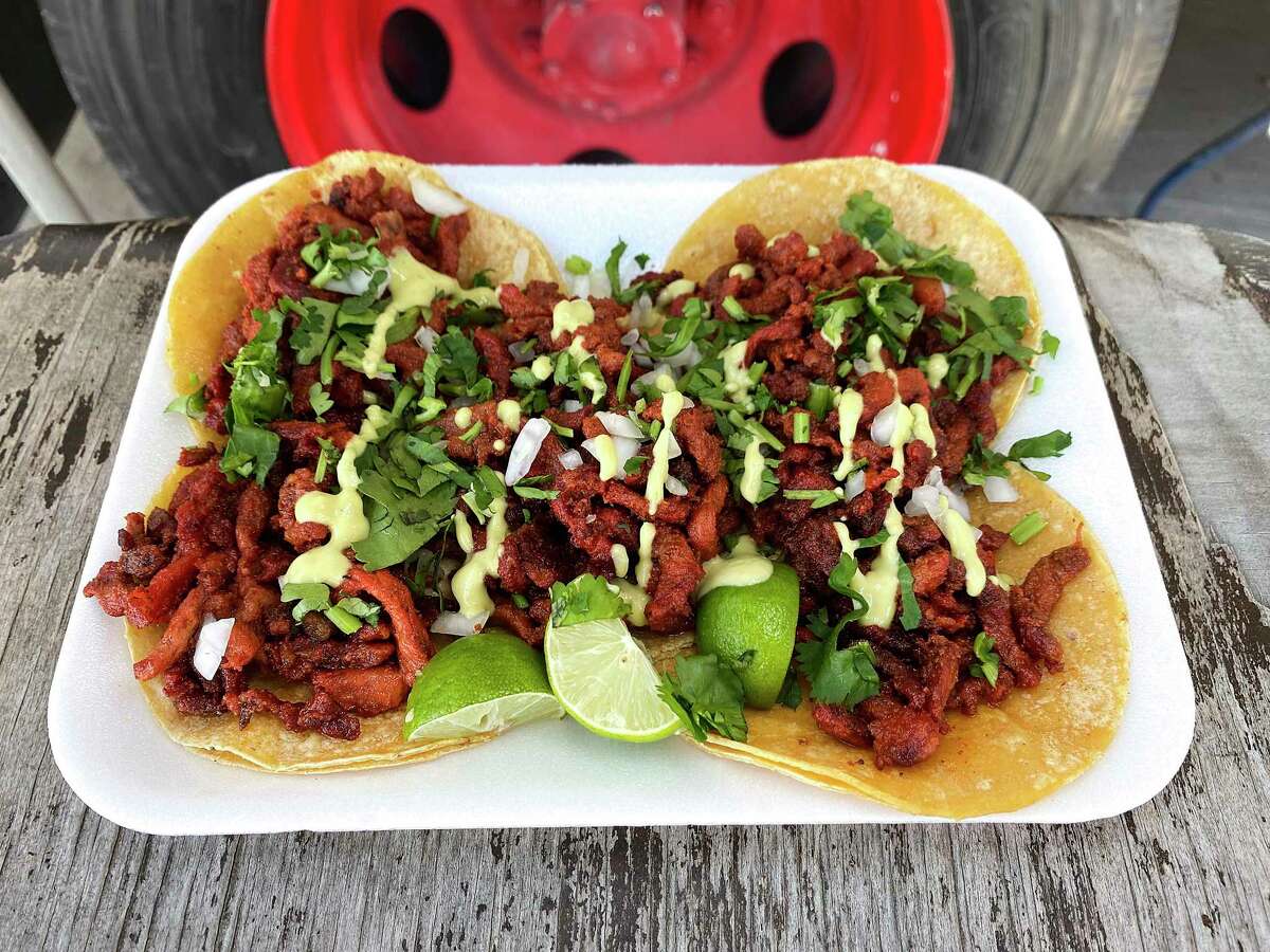 The menu includes street-style al pastor tacos at Tacos Mando, a Mexican taco truck specializing in Monterrey-style tacos al vapor on Hildebrand near Interstate 10.