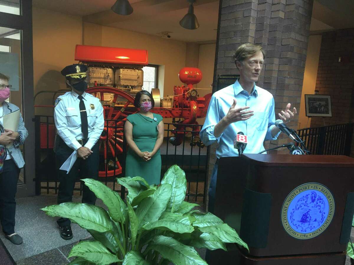 New Haven Mayor Justin Elicker, right, joined by Health Director Maritza Bond, Chief of Police Renee Dominguez and Corporation Counsel Patricia King, talks about how legal cannabis will work in New Haven, beginning July 1, 2021.