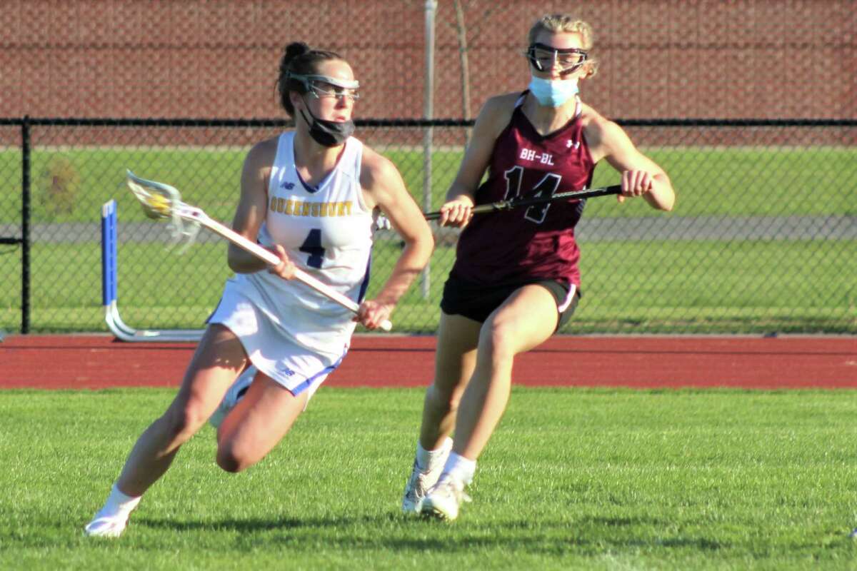 Queensbury's Brigid Duffy, left, is the Times Union girls' lacrosse athlete of the year.