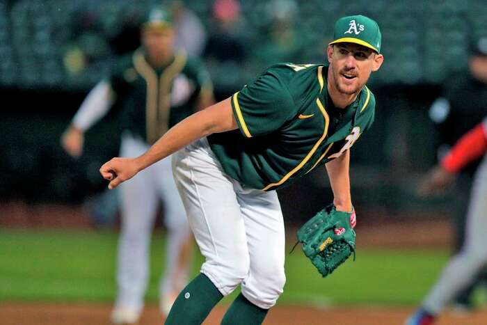 Oakland A's place Mark Canha on 10-day injured list with left hip