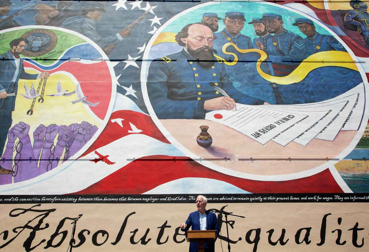 Senator John Cornyn talks to a crowd in attendance for the dedication ceremony of the Absolute Equality mural - which was is part of the Juneteenth Legacy Project - on Saturday, June 19, 2021, in Galveston.