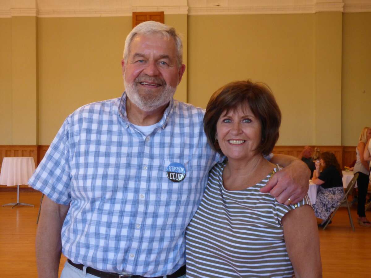 Outgoing city manager Thad Taylor and wife Theresa Taylor enjoy a retirement celebration held at the Ramsdell Regional Center for the Arts on Thursday. Taylor steps down from his position on June 2.