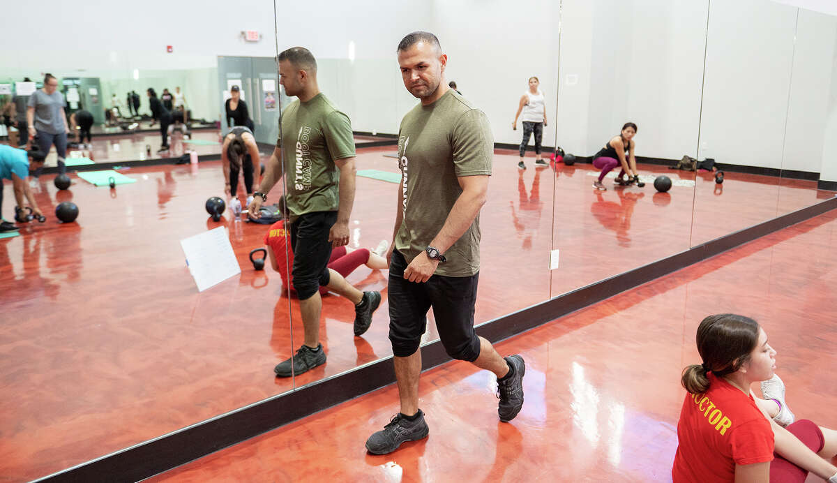 Gustavo Gonzalez encourages one of his first classes at the Lomas Del Sur location in Rock Fitness gym, Thursday, July 1, 2021.