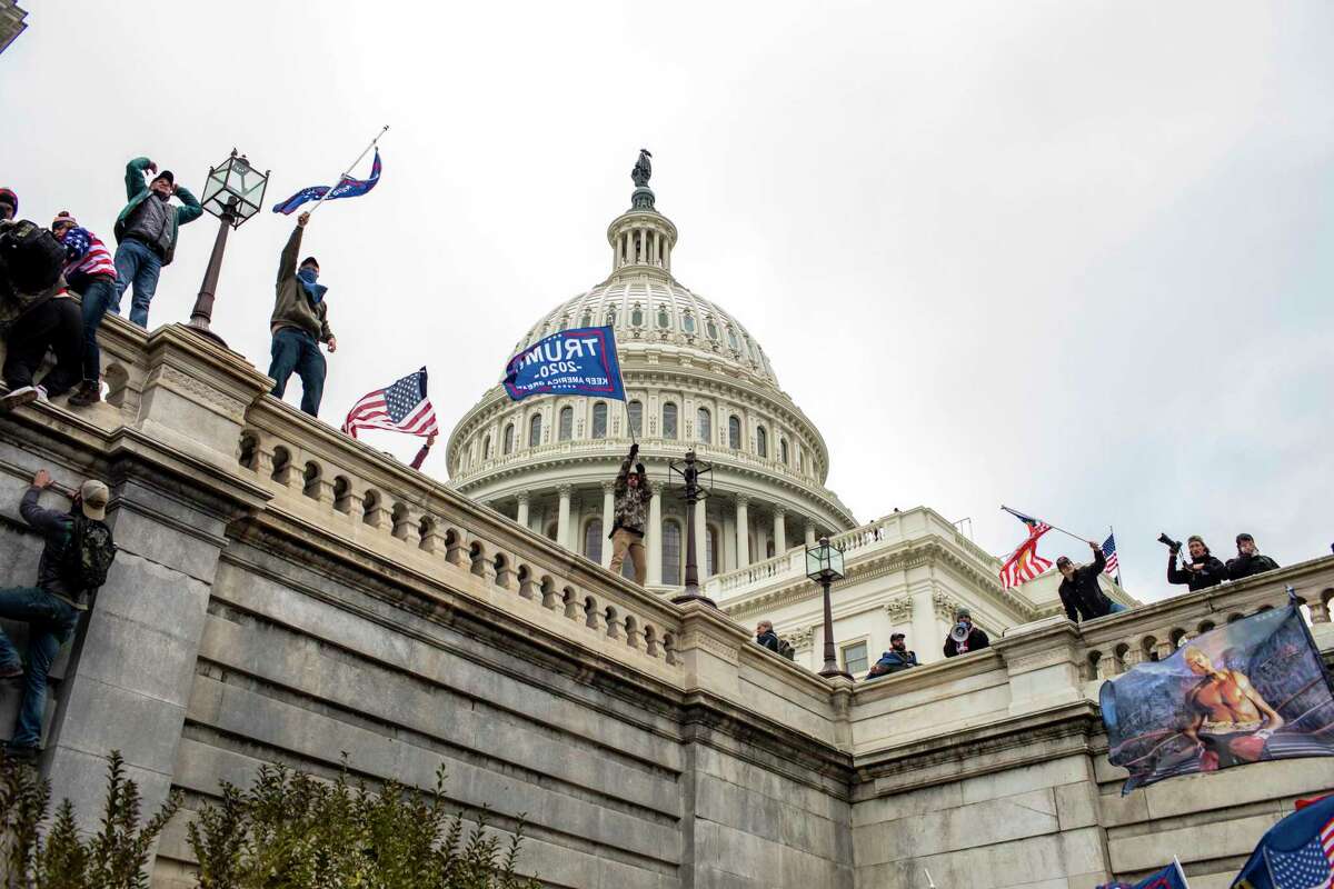 FILE -- Protesters on the Senate side of the United States Capitol in Washington on Jan. 6, 2021. (Jason Andrew/The New York Times)