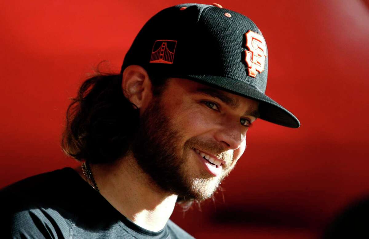 PHOENIX, ARIZONA - JULY 01: Brandon Crawford #35 of the San Francisco Giants talks with a teammate prior to the MLB game against the Arizona Diamondbacks at Chase Field on July 01, 2021 in Phoenix, Arizona. (Photo by Ralph Freso/Getty Images)