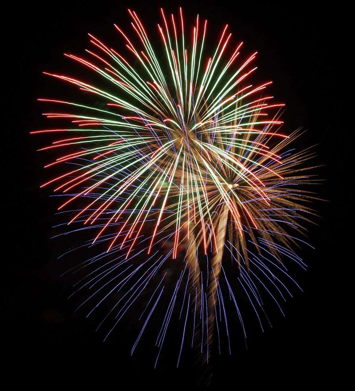 A multi-colored fireworks display explodes over Fairfield's shoreline in a star-spangled salute to the July 4 holiday.