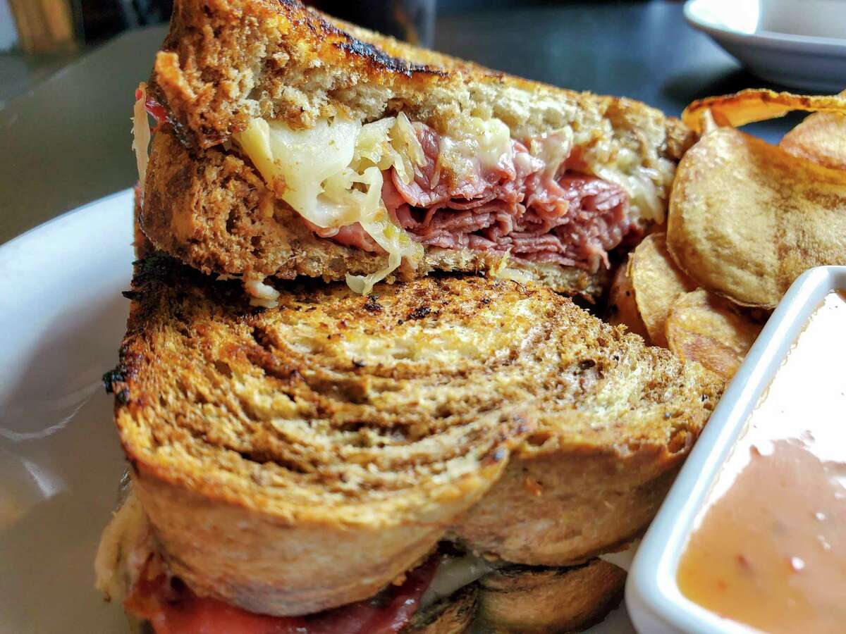 Nunn's lunch was a reuben sandwich, served with homemade chips and an onion petal side.