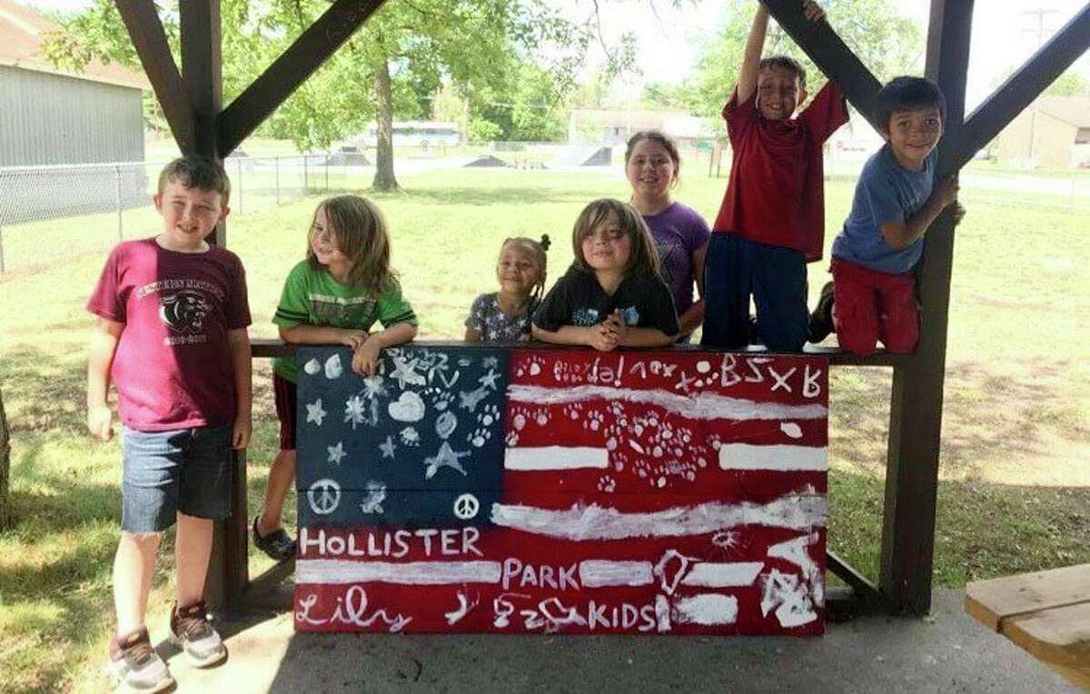 Pictured is the Kids Play Day activity held on June 30. Local kids created a patriotic flag, which is currently on display at Putkela Farms. (Submitted photo)