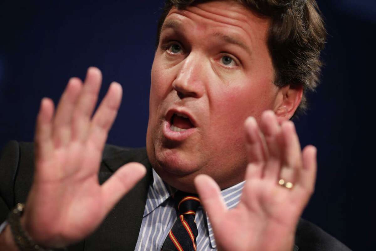 FILE PHOTO Fox News host Tucker Carlson speaks at the National Review Institute's Ideas Summit at the Mandarin Oriental Hotel on March 29, 2019, in Washington, D.C. (Chip Somodevilla/Getty Images/TNS)