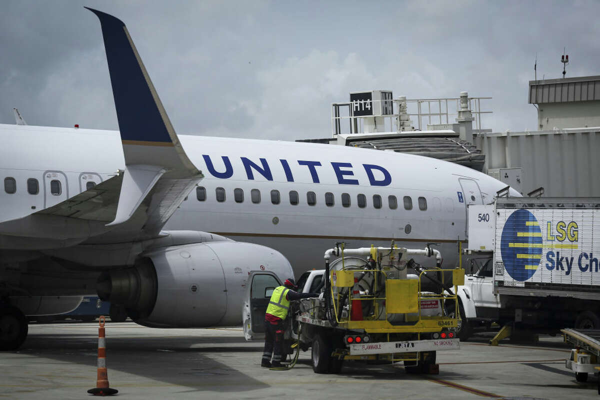 A United Airlines airplane is seen at a gate of Miami International Airport, in Miami, Florida, United States on June 16, 2021.