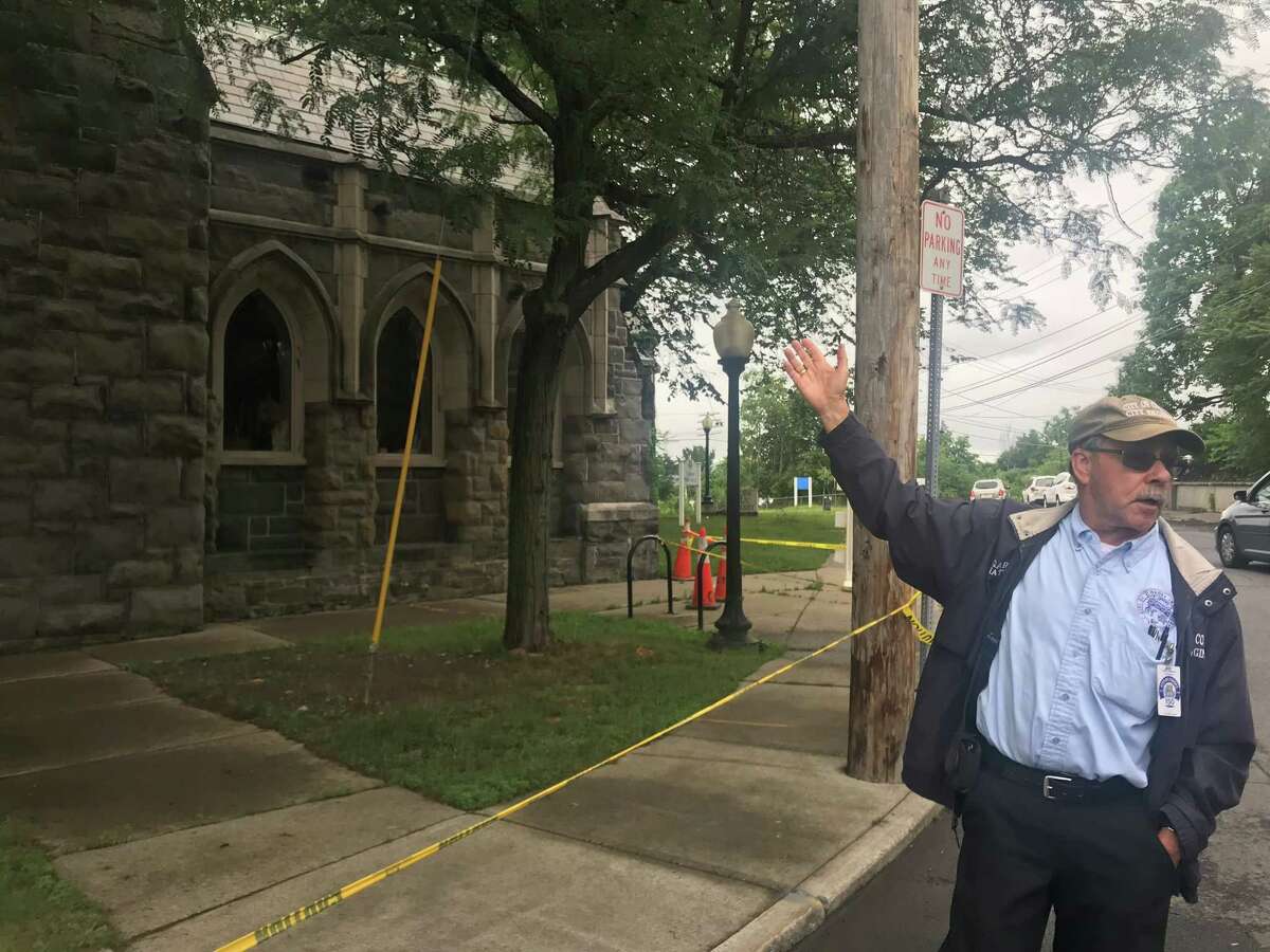 Cohoes City Engineer Garry Nathan points to the damaged Cohoes Public Library in Cohoes, N.Y. on Friday July 2, 2021.