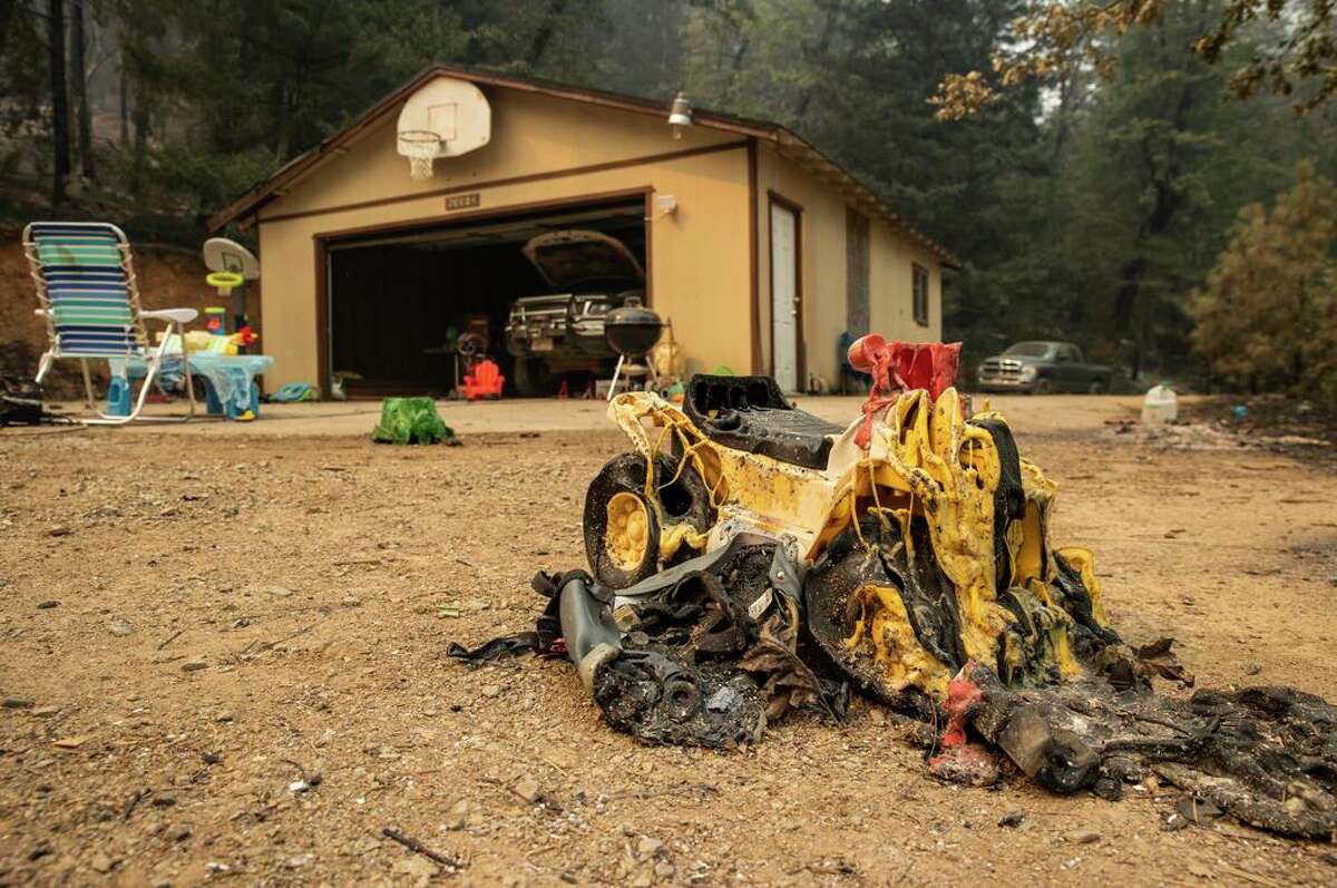 A melted toy car near a property damaged by the Salt Fire east of Interstate 5 near Lakehead.