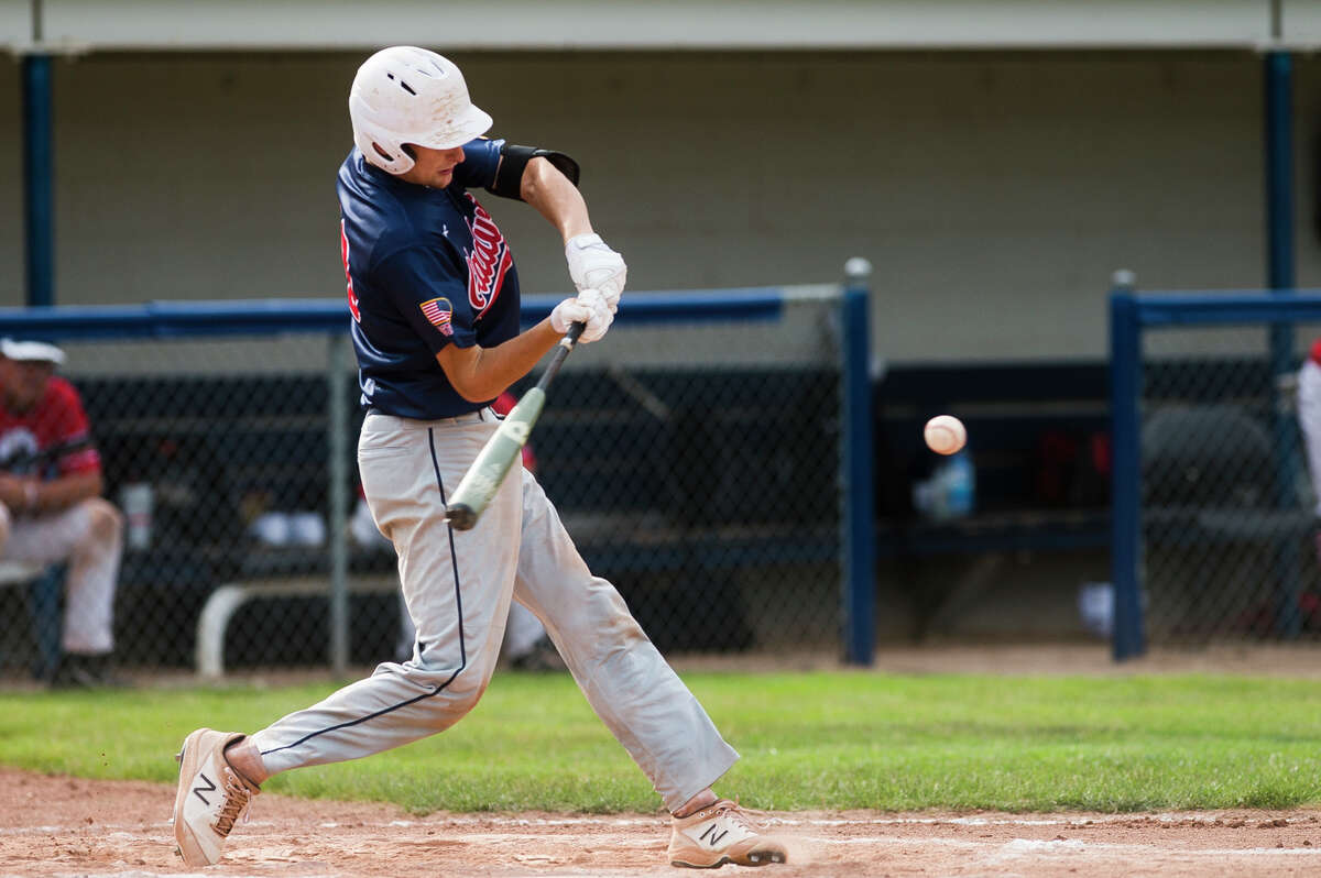 Gladwin's Carter Campau swings on a pitch during a game against the Detroit Warriors in the Gabby Mills July Fourth Invitational Friday, July 2, 2021 at Northwood University. 