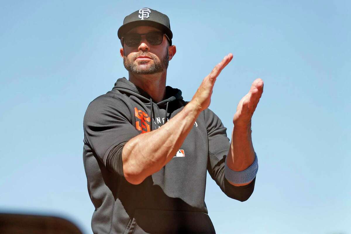 San Francisco Giants' manager Gabe Kapler applauds after 11-2 win over Philadelphia Phillies in MLB game at Oracle Park in San Francisco, Calif., on Sunday, June 20, 2021.