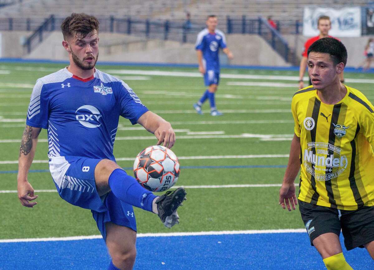 Sockers' Cian Foley tries to control the ball as FW Vaqueros' Luis Martinez comes in to defend 07/02/2021 at Grande Communications Stadium. Tim Fischer/Reporter-Telegram