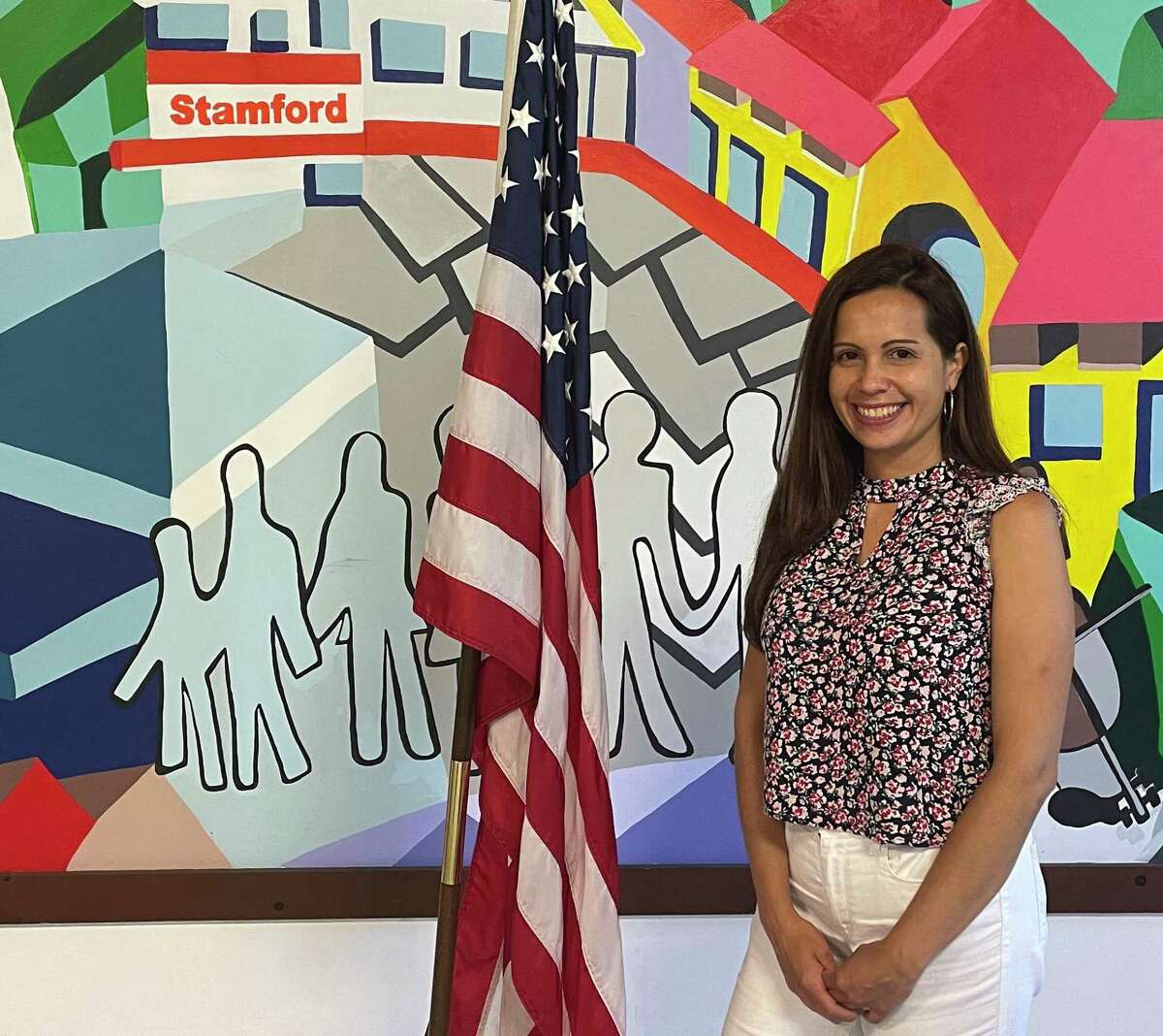 Alejandra Gomez, who works for Building One Community/The Center for Immigrant Opportunity in Stamford, is celebrating her first Fourth of July as a U.S. citizen.
