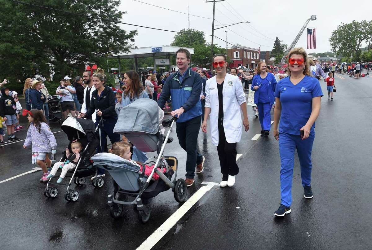 COVID-19 heroes served as the grand marshals in the Independence Day Parade in Madison on July 4, 2021.
