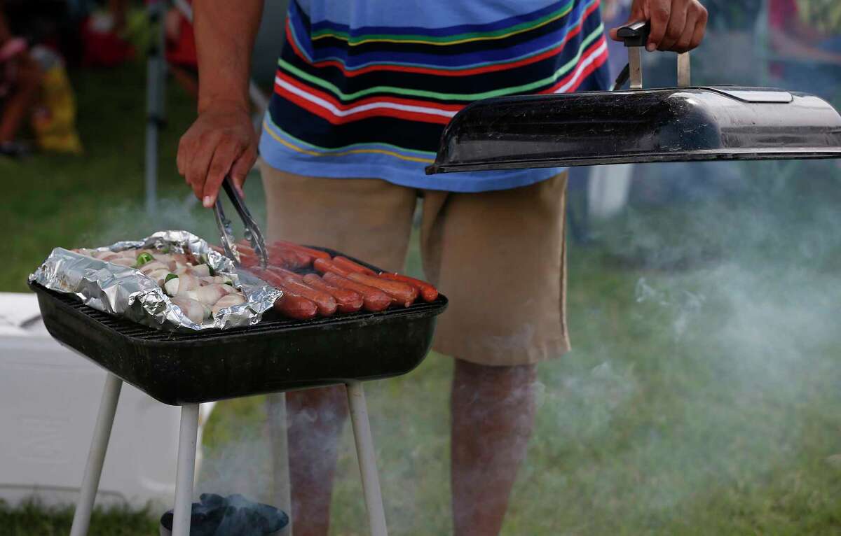 Hotdogs and chicken were the food of choice on the grills at Woodlawn Lake Park on July 4th, 2021.