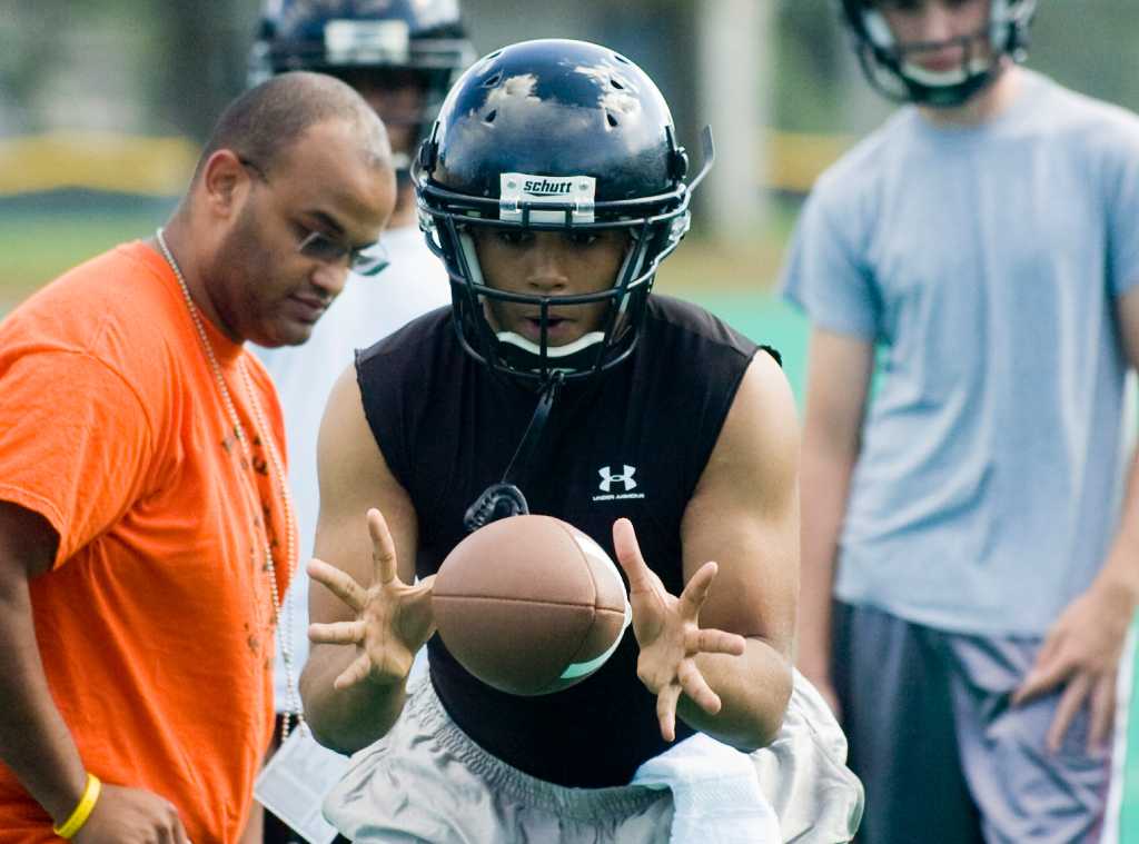 Preseason high school football camps