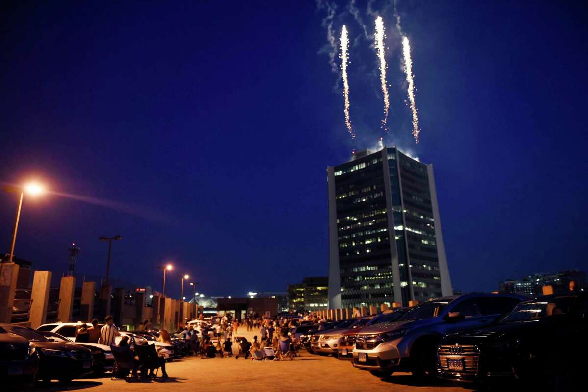 Fireworks launched from atop the Landmark Tower light up the sky in Stamford, Conn. Monday, July 5, 2021. The Fourth of July fireworks show, presented by the Stamford Downtown Special Services District, went on Monday night after being initially postponed due to inclement weather.