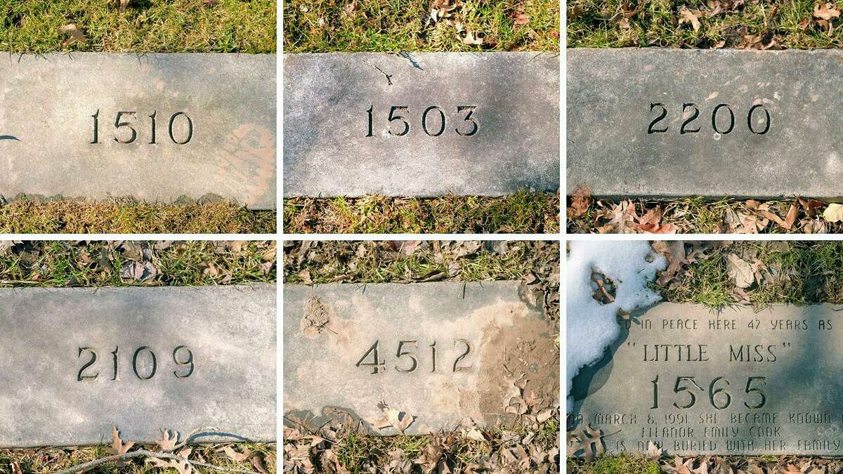 This undated file photo shows markers of unidentified remains buried at Northwood Cemetery in Windsor, Conn., of people who died in the 1944 Hartford, Conn., circus fire.