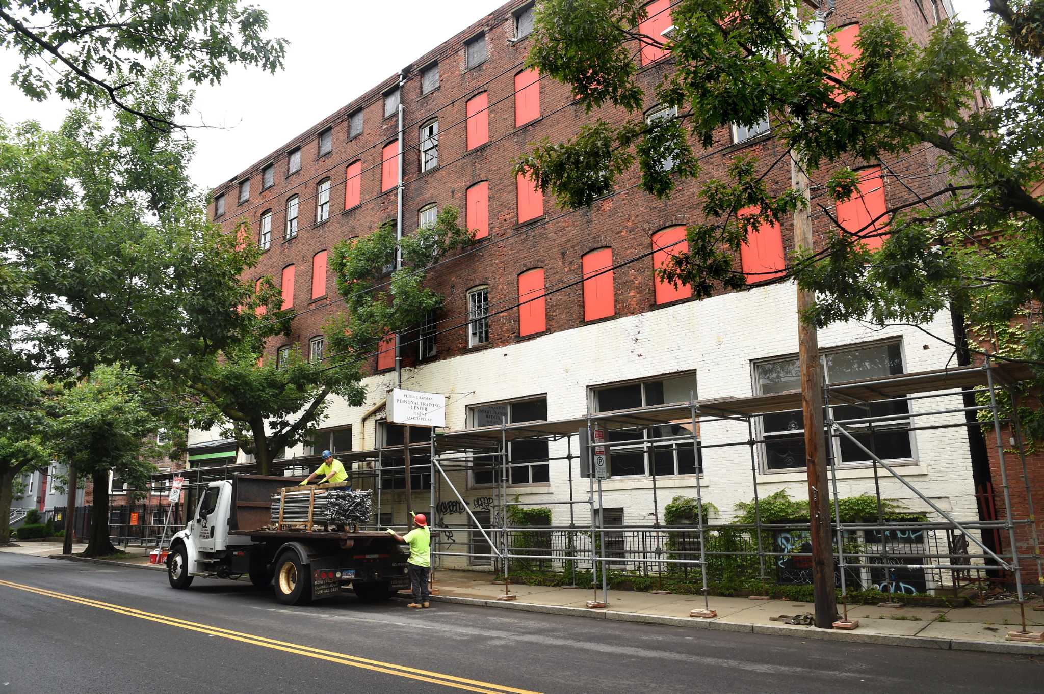 Scaffolding installed outside New Haven building after bricks fall to ...