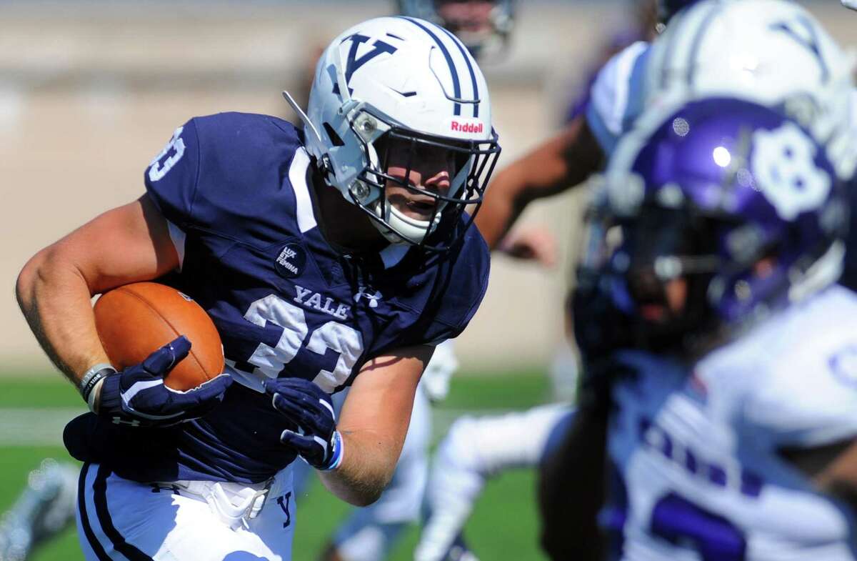 Yale's Zane Dudek, seen carrying the ball against Holy Cross on Sept. 21, 2019, is a Barstool Athlete.
