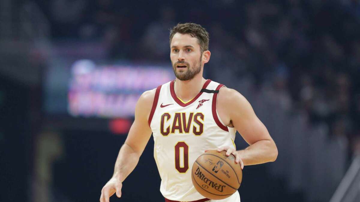 Cleveland Cavaliers' Kevin Love drives against the Miami Heat in the first half of an NBA basketball game, Monday, Feb. 24, 2020, in Cleveland. (AP Photo/Tony Dejak)