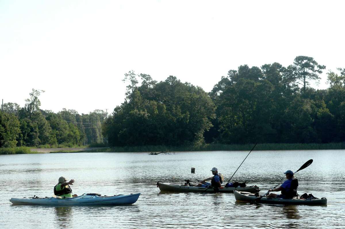 Canoers and kayakers pass as they go to and from the Salt Water Barrier site as they join in the Neches River Rally Saturday. Photo taken Saturday, September 7, 2019 Kim Brent/The Enterprise