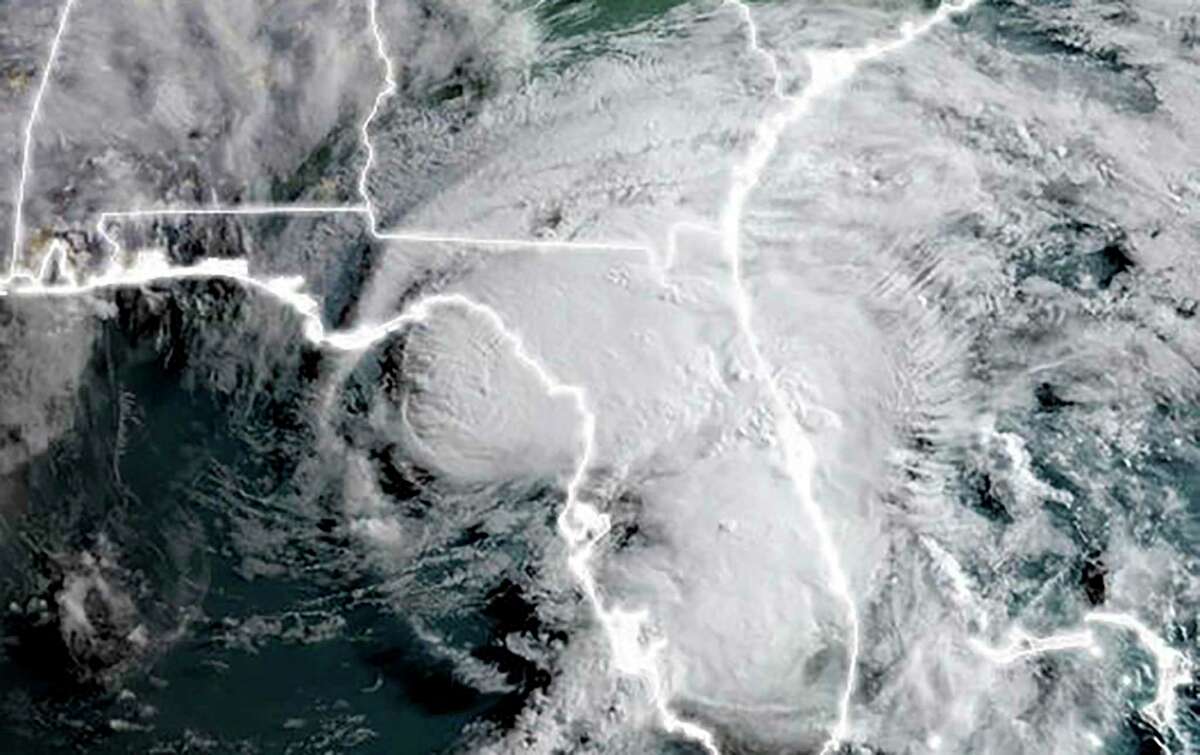 This National Oceanic and Atmospheric Administration (NOAA) satellite image taken at 11:50 UTC on July 7, 2021 shows Tropical Storm Elsa located about 70 miles (115 kilometers) northwest of Tampa, Florida with maximum sustained winds near 65 mph (100 km/h), the NHC said in a public advisory at 5 am. As it moved toward Florida's Gulf Coast early July 7, 2021, Elsa weakened to a tropical storm, though it still barreled inland with gusty winds and heavy rains, the US National Hurricane Center said. While some fluctuations in intensity remain possible until landfall later Wednesday morning, the hurricane warning for much of the state's west coast has been replaced with a tropical storm warning, the NHC said.