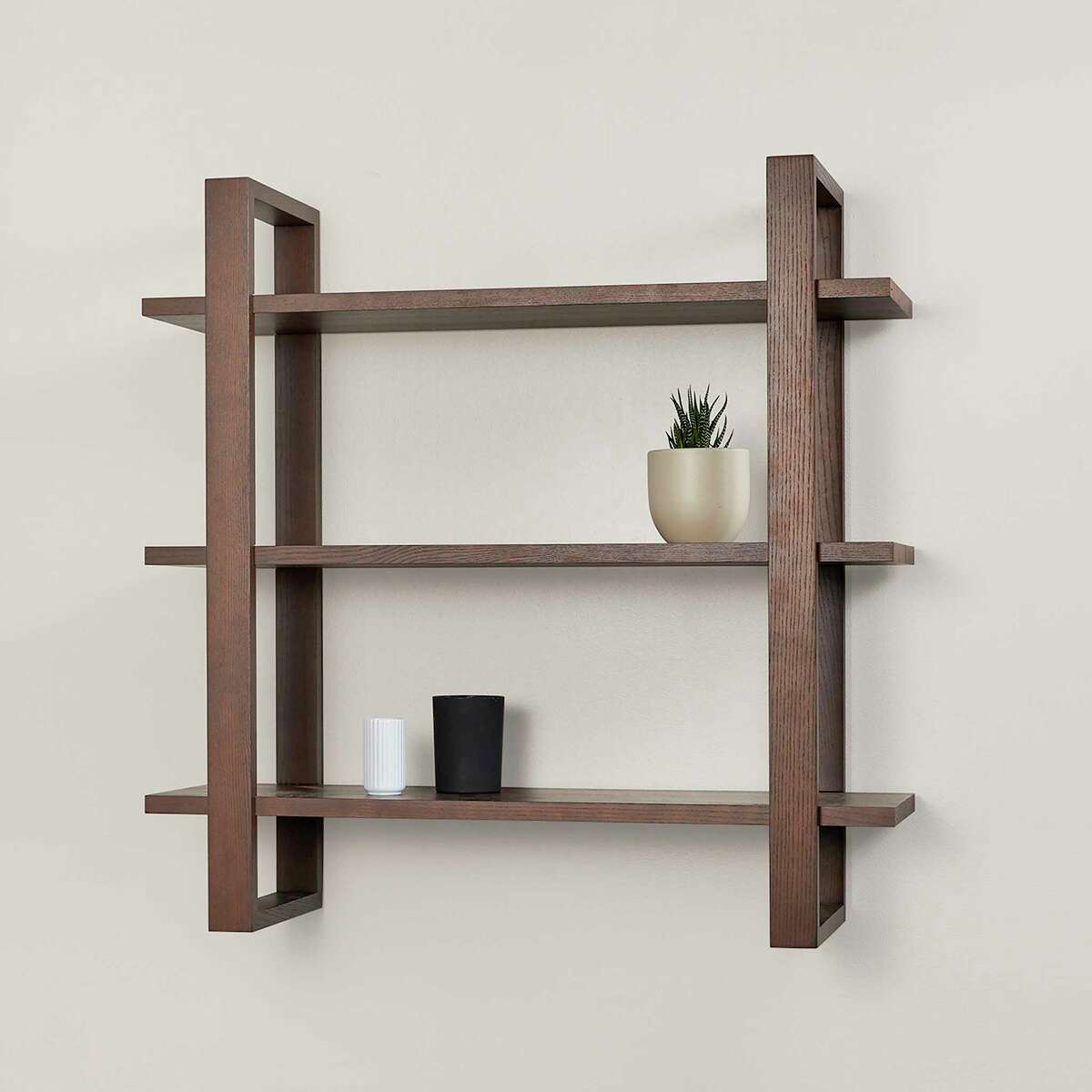 Burrow Index wall shelves ($325 each, westelm.com), available in a white, walnut or oak finish, can be grouped horizontally or vertically to create as much storage as needed.