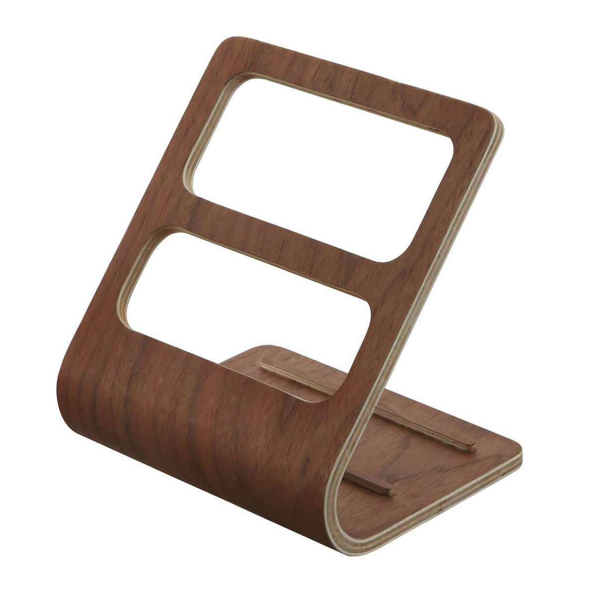 The Yamazaki remote control organizer rack ($25, westelm.com). Designed in Japan and made in China with plywood, the piece has a small footprint at roughly 5 by 6 by 6 inches.