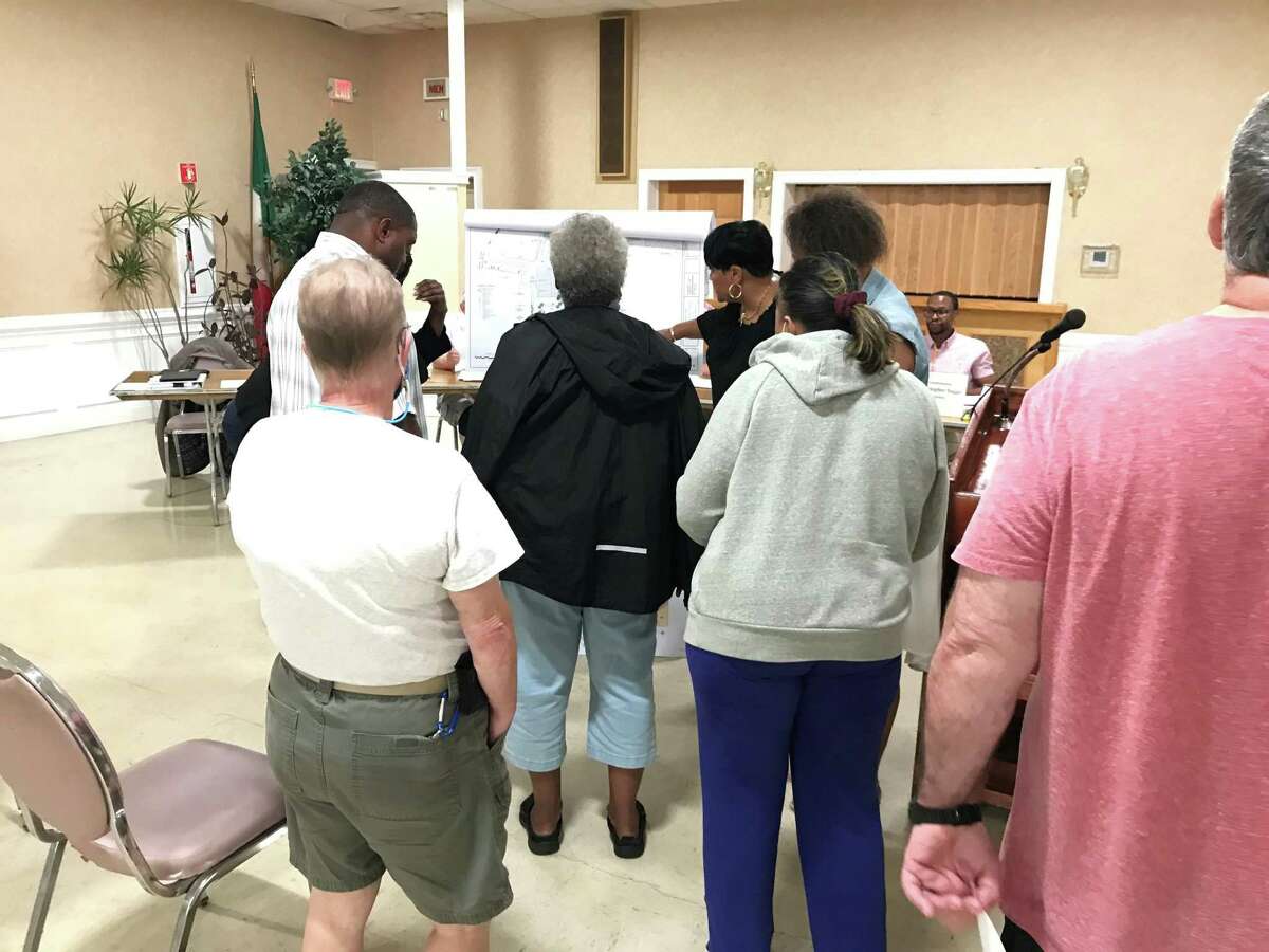 Residents view a site proposal for 855 Boston Post Road at a July 6, 2021 Planning and Zoning Commission meeting.
