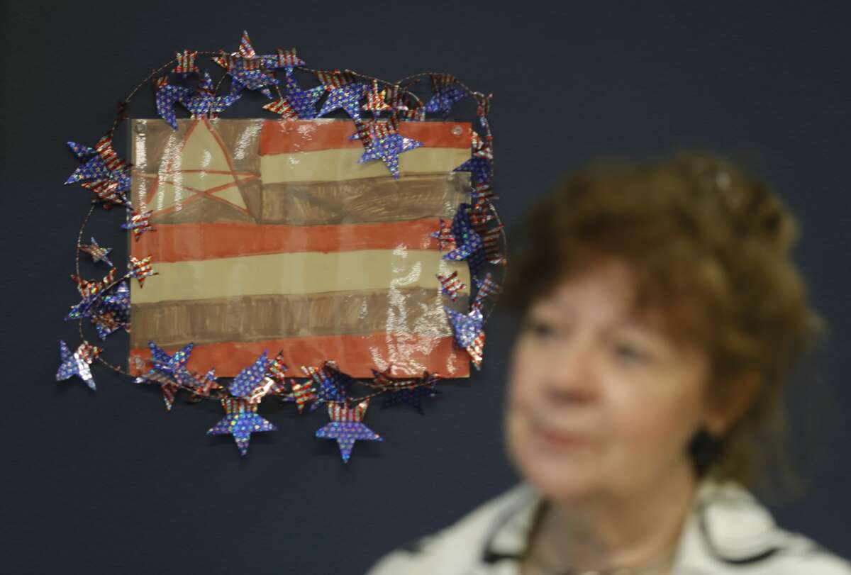 359th state District Court Judge Kathleen Hamilton shares how they once used a flag illustration by a girl in a family law case to say the national anthem in her courtroom, June 30, 2021, in Conroe.