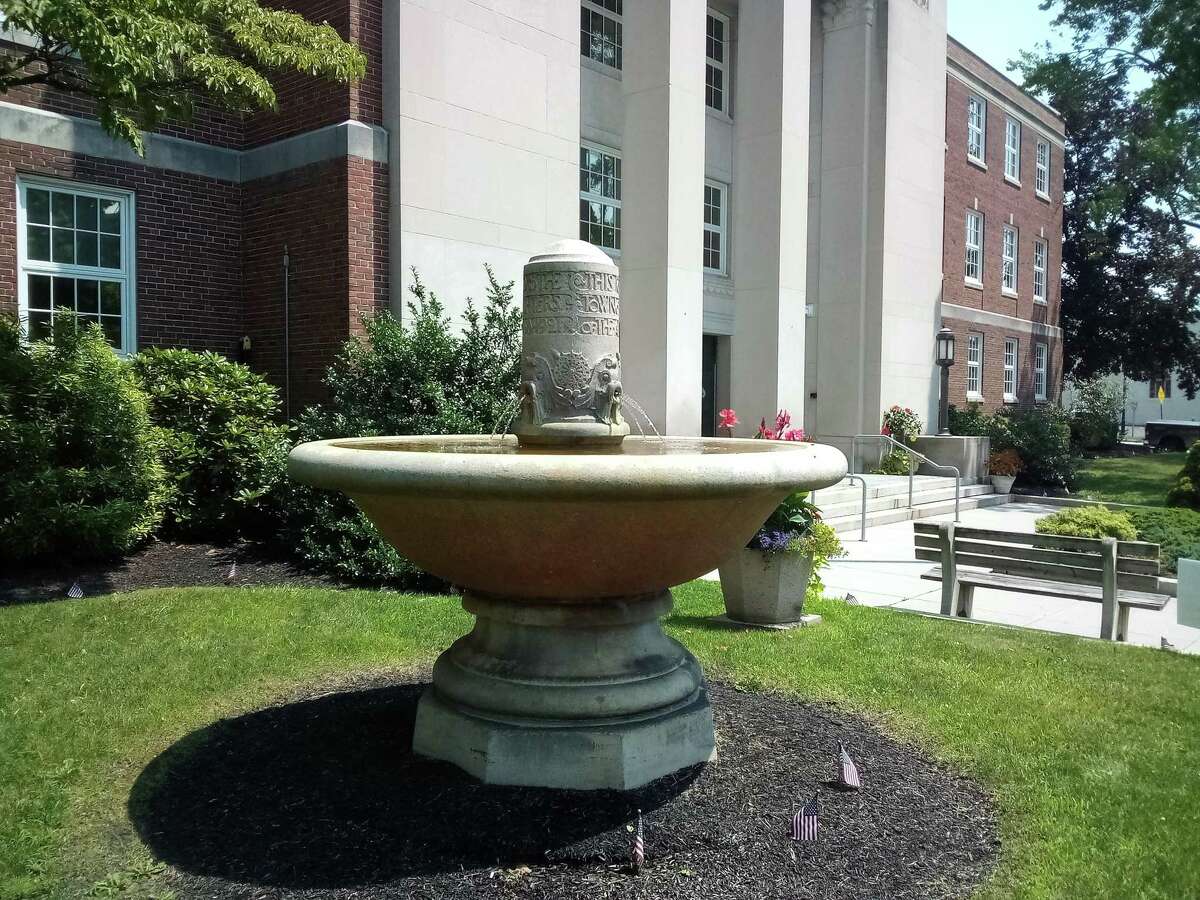 A fountain on the front lawn of Torrington City Hall, which was installed on Main Street in 1921 as a watering trough for horses, is being moved to Franklin Plaza this summer.