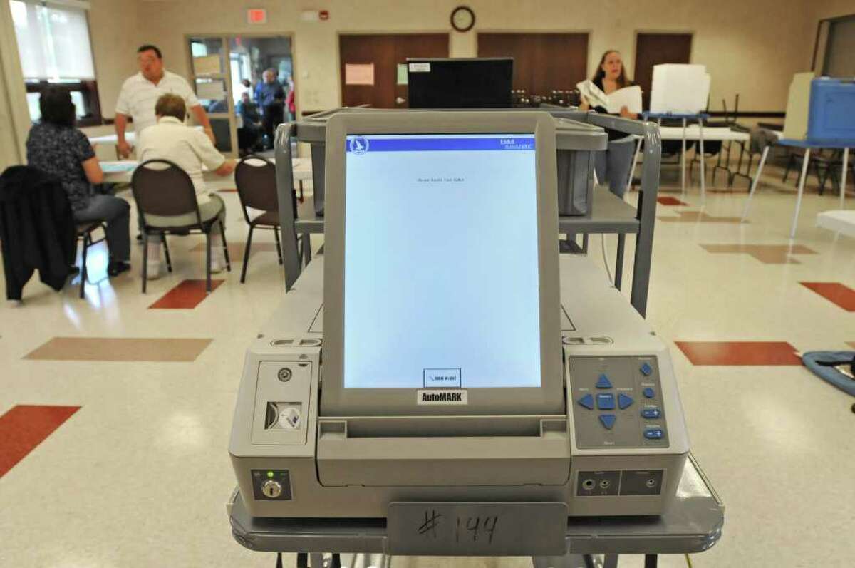 A new handicap-accessible voting machine is available at the Western Turnpike Rescue Squad polling place in Guilderland on September 14, 2010. (Lori Van Buren / Times Union)